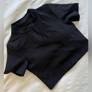 Black tee shirt 1/4 zip with removable pads and bra lining
